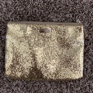 Gold sparkle Kate Spade pouch. Never used.